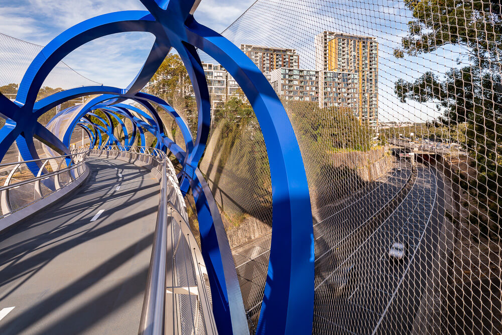 Barrier Considerations for Footbridges Over Busy Roads / Tensile Design & Construct