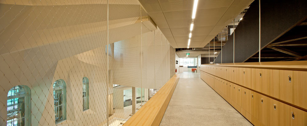 How Near Transparent Barriers are Transforming Architecture / Tensile Design & Construction